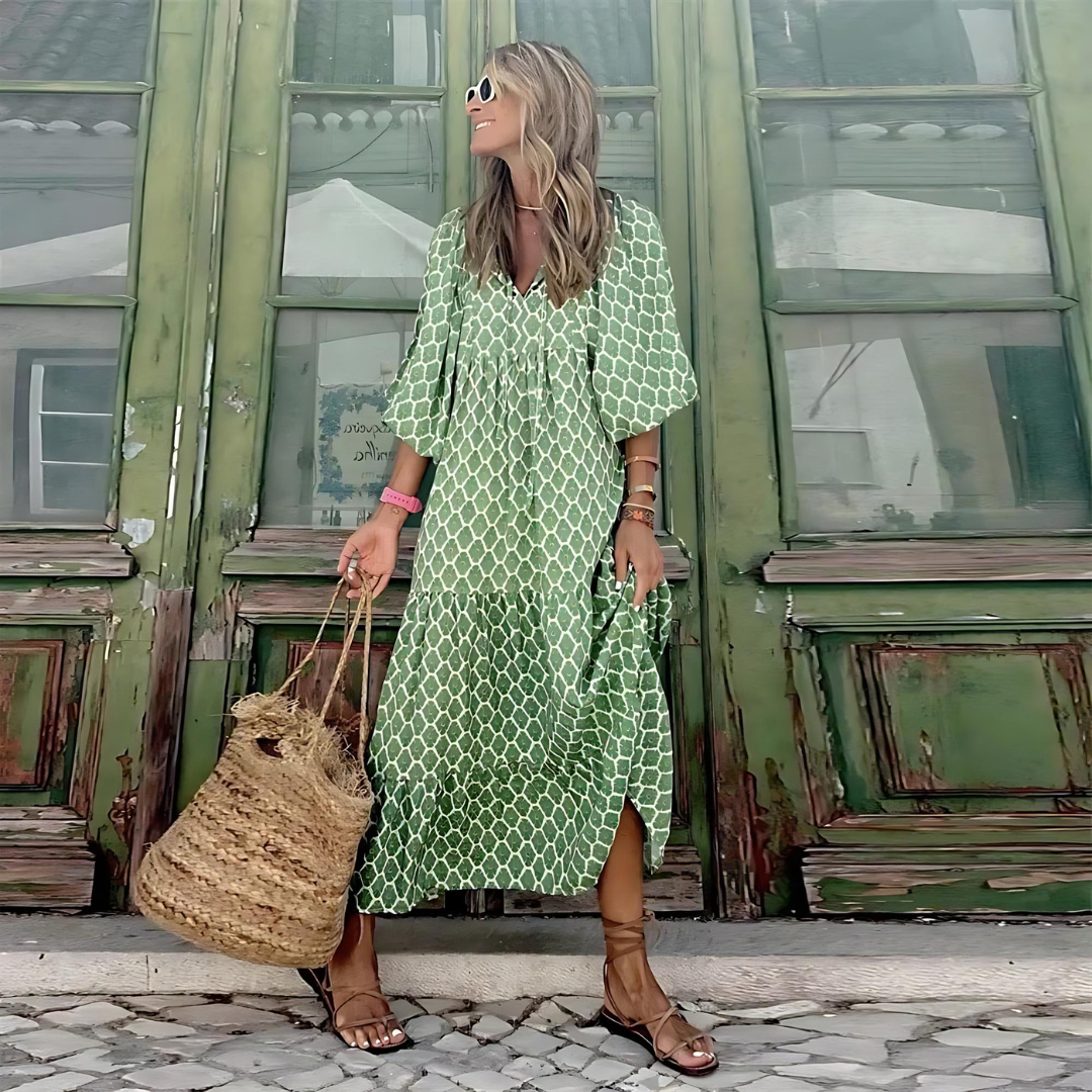 Cassandra - Damesjurk met geometrische print in hoog-laag-look