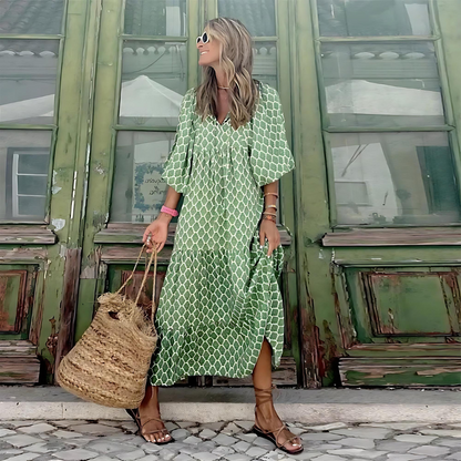 Cassandra - Damesjurk met geometrische print in hoog-laag-look