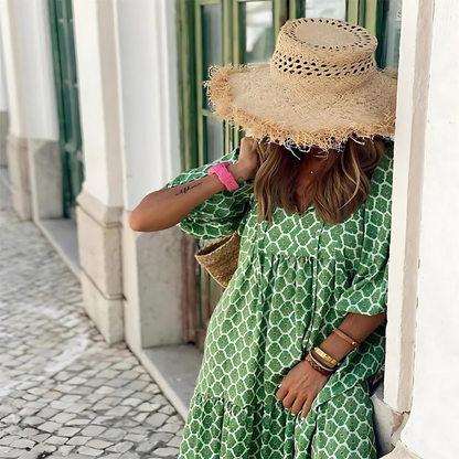 Cassandra - Damesjurk met geometrische print in hoog-laag-look