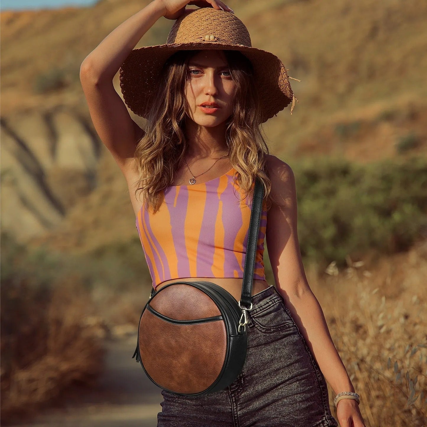 Noelia - Ronde dames schoudertas in vintage lederlook