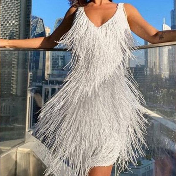 Jutte | Glitterende jurk met franjes