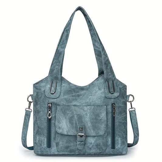 Emilias geräumige Schultertasche im Retro-Stil