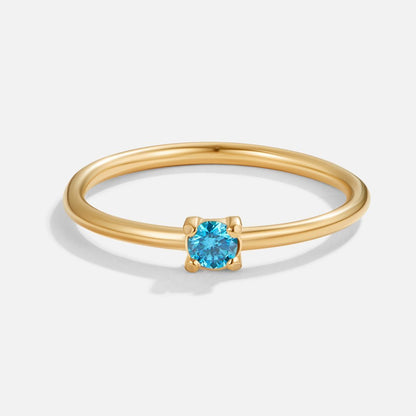 Gouden ring met geboortesteen van december