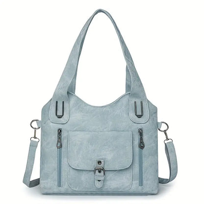 Emilias geräumige Schultertasche im Retro-Stil