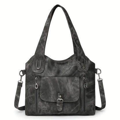 Emilias geräumige Schultertasche im Retro-Stil