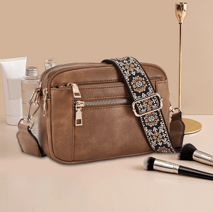Nylah - Crossbodytas met kleurrijke banden