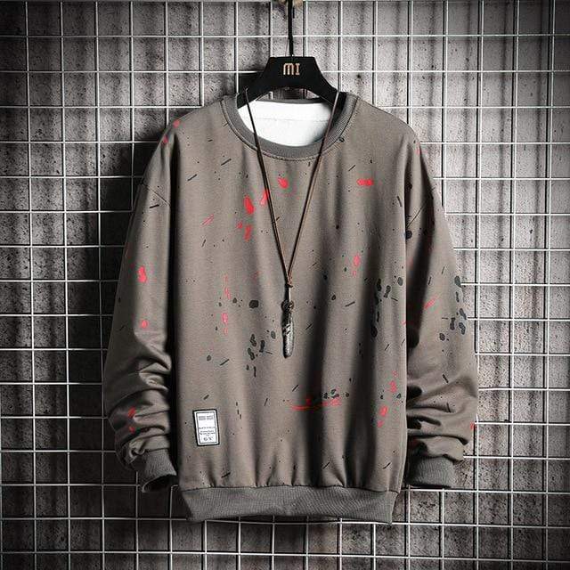 Zwart humoristisch 'splatter' sweatshirt